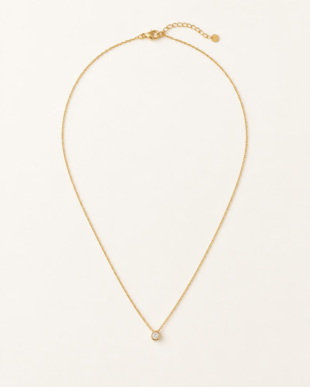Minimal gold necklace with small pendant